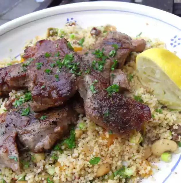 Spiced lamb steaks recipe with warm moroccan couscous salad