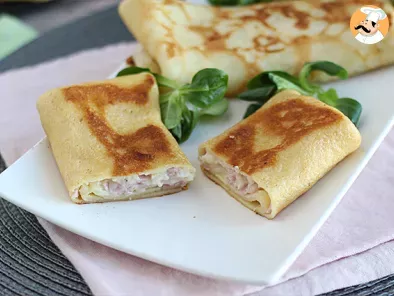 Stuffed crepes with béchamel sauce and ham