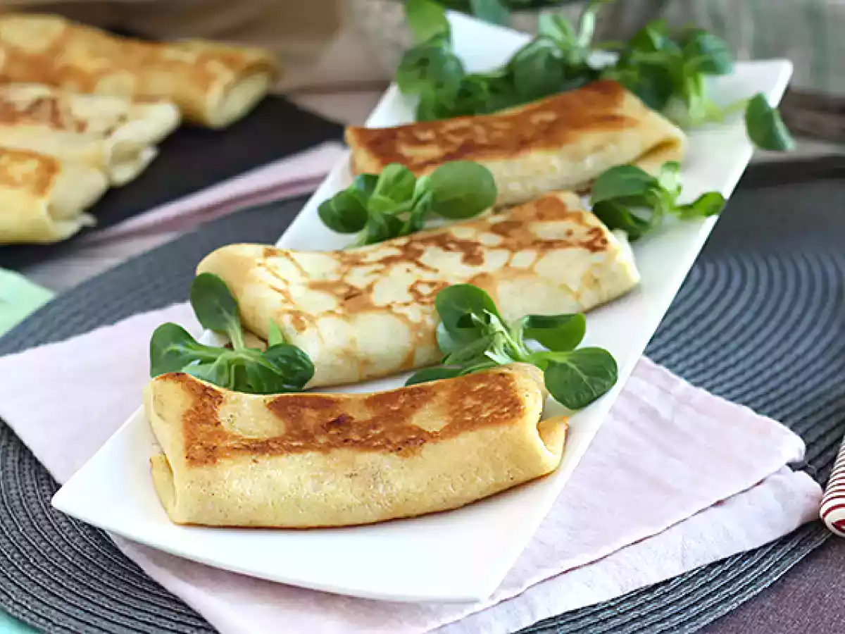 Stuffed crepes with béchamel sauce, cheese, and ham - photo 2