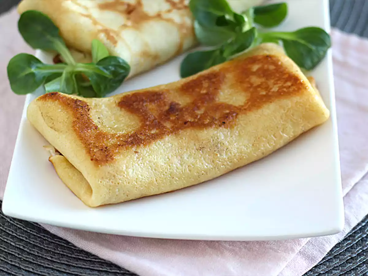Stuffed crepes with béchamel sauce, cheese, and ham - photo 3