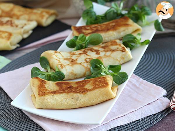 Stuffed crepes with béchamel sauce, cheese, and ham - photo 2