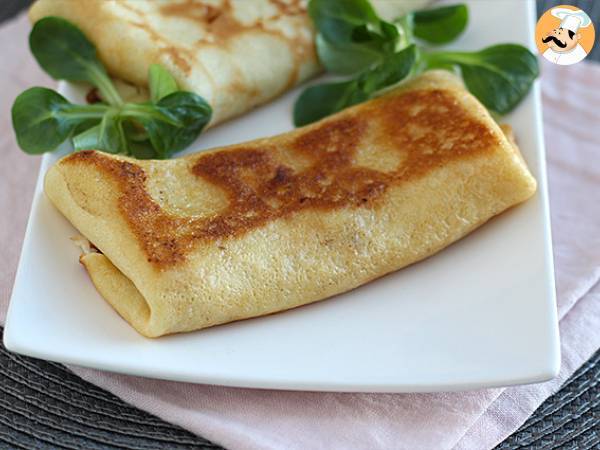 Stuffed crepes with béchamel sauce, cheese, and ham - photo 3