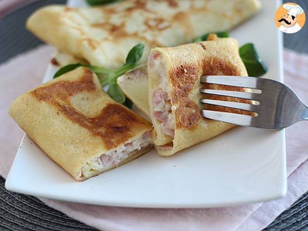 Stuffed crepes with béchamel sauce, cheese, and ham - photo 4