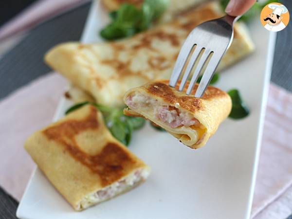 Stuffed crepes with béchamel sauce, cheese, and ham - photo 5