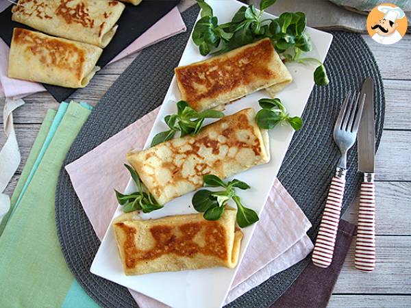 Stuffed crepes with béchamel sauce, cheese, and ham - photo 6