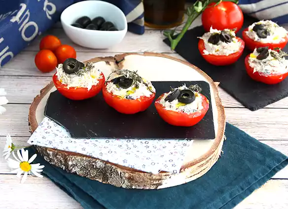 Stuffed tomatoes with tuna, cream cheese, and olives