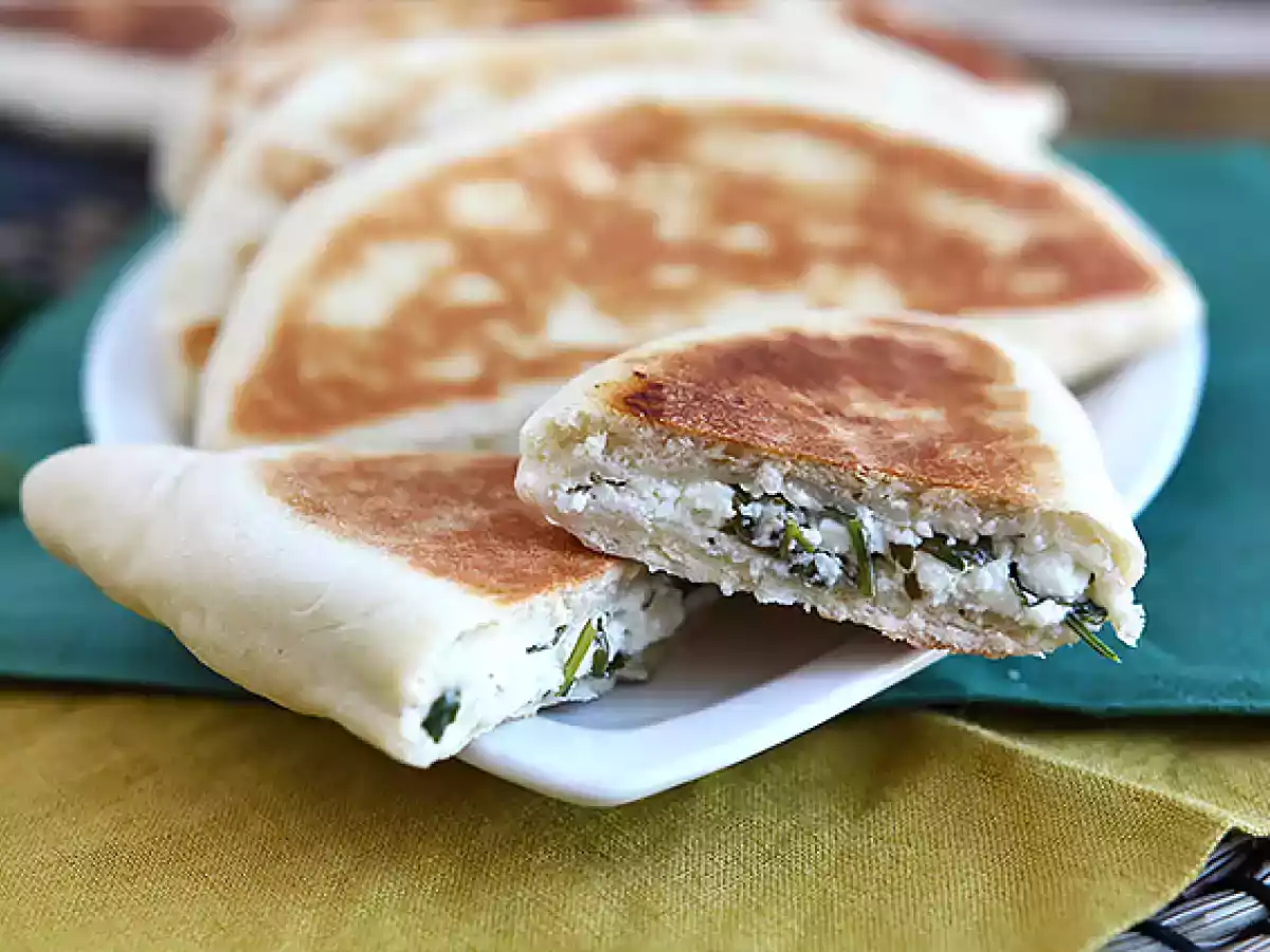 Stuffed turkish crepes with feta, lemon, and parsley - gözleme