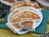 Stuffed turkish crepes with feta, lemon, and parsley - gözleme, photo 1