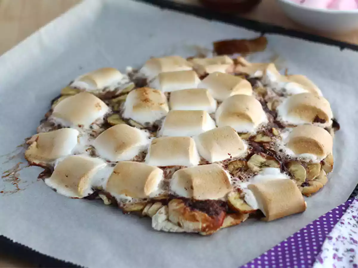 Sweet pizza with banana and chocolate