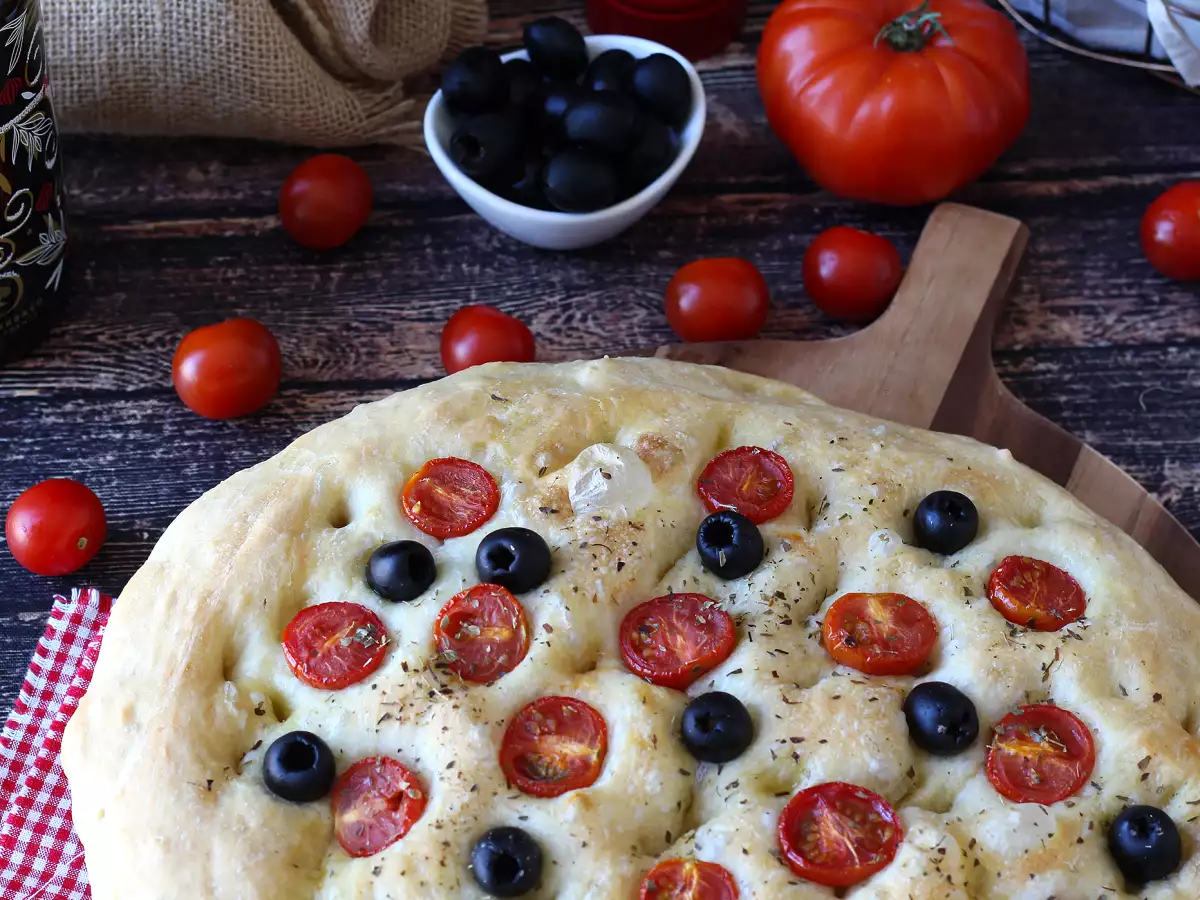 Thick, fluffy focaccia with cherry tomatoes, olives, and oregano - photo 3