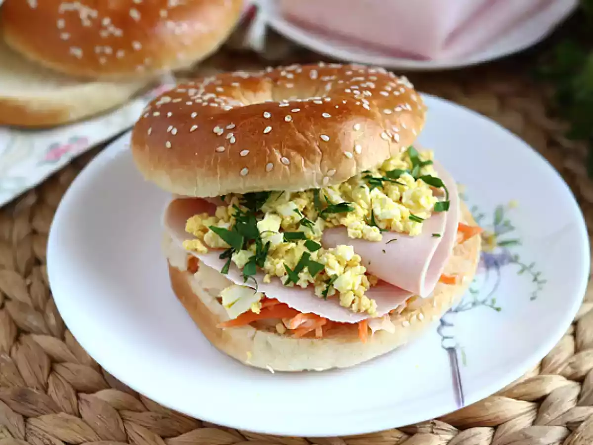 Turkey, coleslaw, and hard-boiled egg bagel sandwich