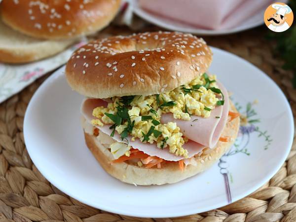 Turkey, coleslaw, and hard-boiled egg bagel sandwich