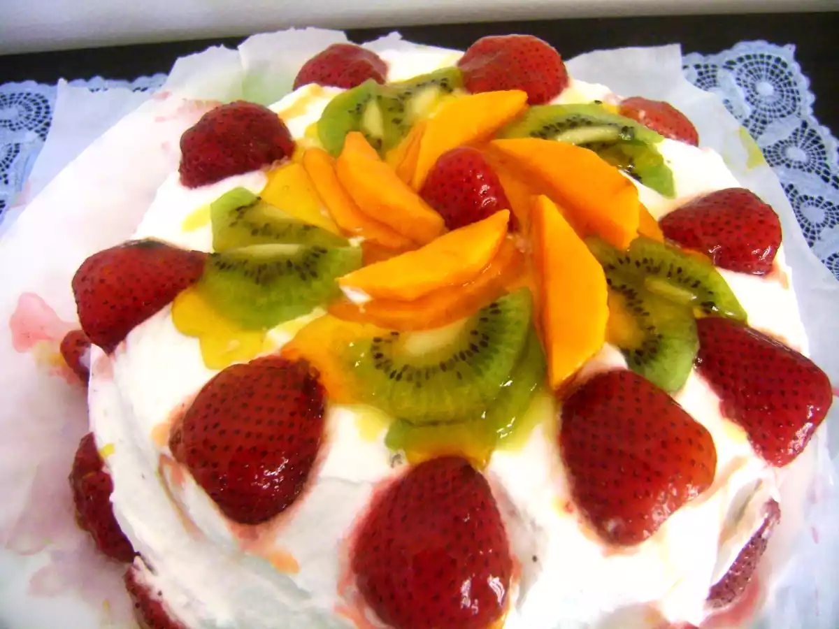 Vanilla cake with Whipped Cream and Fresh fruit frosting