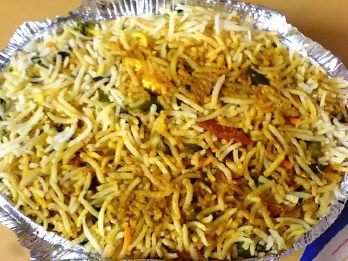 Veg Biryani and Cabbage, Onion, Tomato Upma