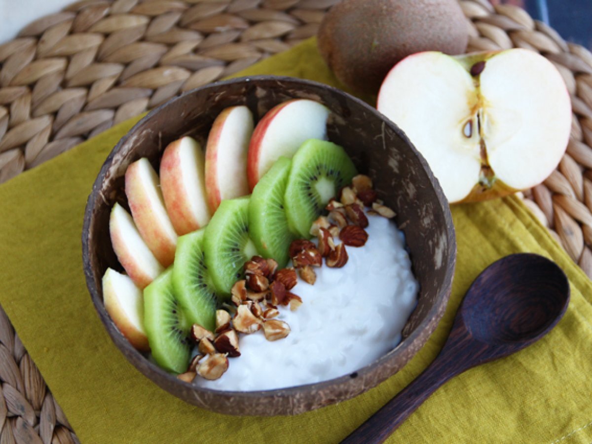 Vegan bowl with coconut milk yogurt, fruits and nuts