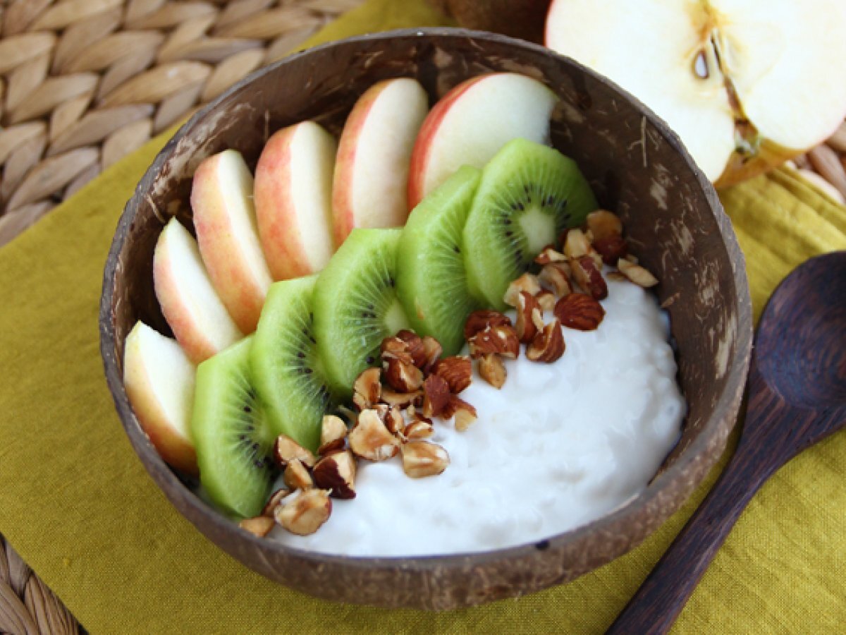 Vegan bowl with coconut milk yogurt, fruits and nuts - photo 3