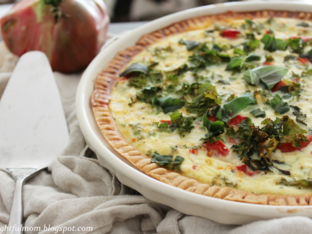 Vegetable quiche made with fresh tomatoes, spinach, basil and goat