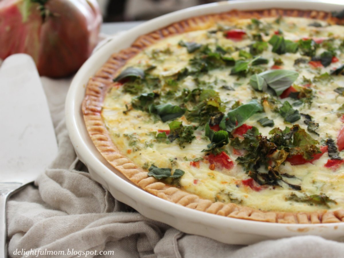 Vegetable quiche made with fresh tomatoes, spinach, basil and goat