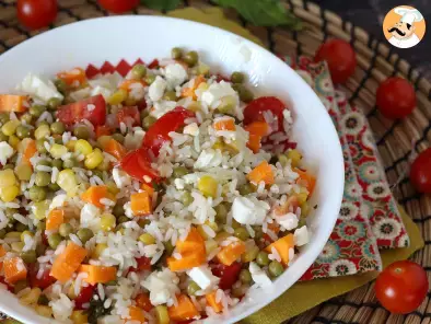 Vegetarian rice salad: feta, corn, carrots, peas, cherry tomatoes and mint