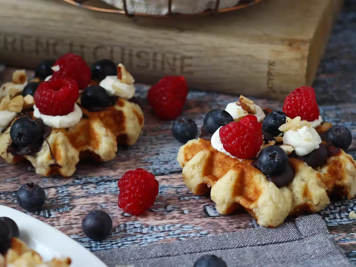 Waffles topped with fruit, chocolate and whipped cream - photo 3