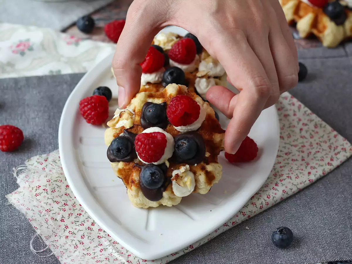Waffles topped with fruit, chocolate and whipped cream - photo 4