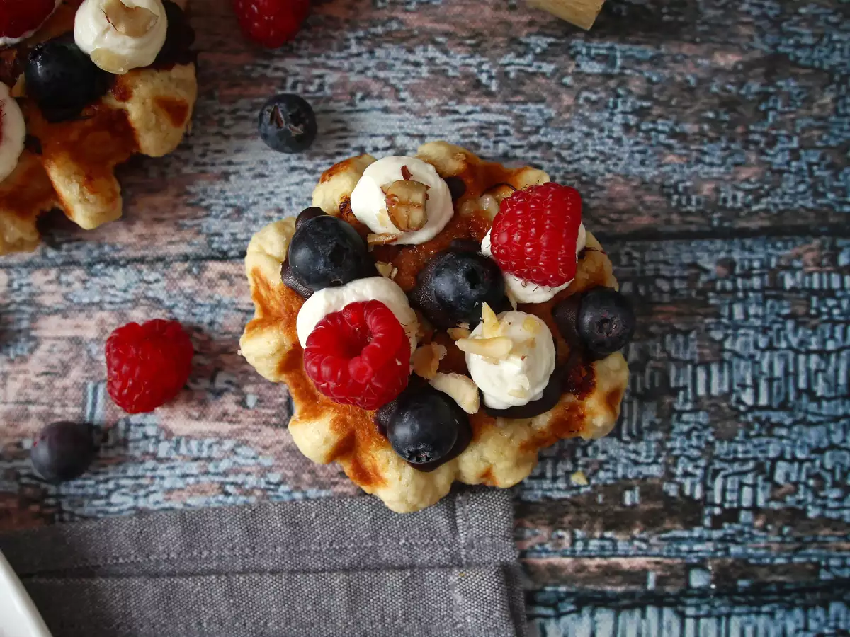 Waffles topped with fruit, chocolate and whipped cream - photo 8