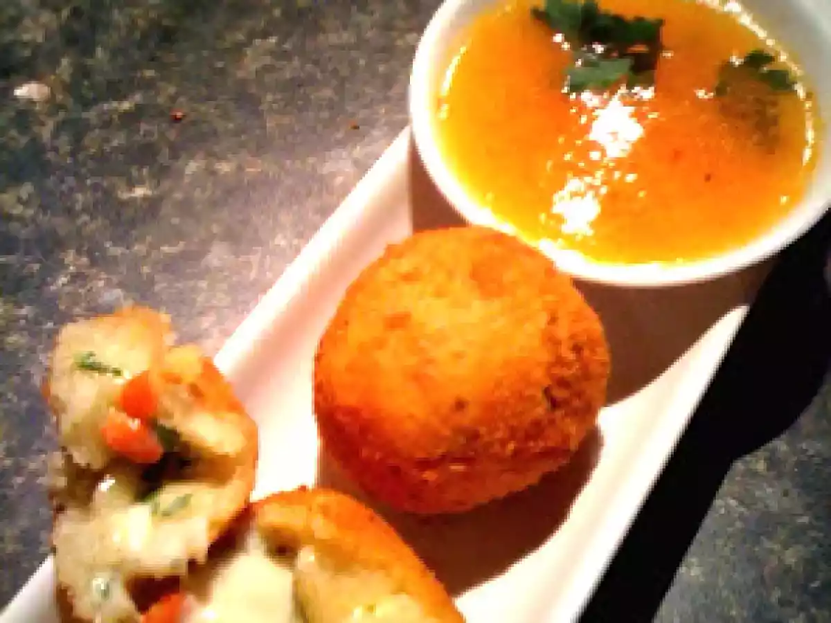 Yuca beignets filled with cheese and Orange spicy sauce